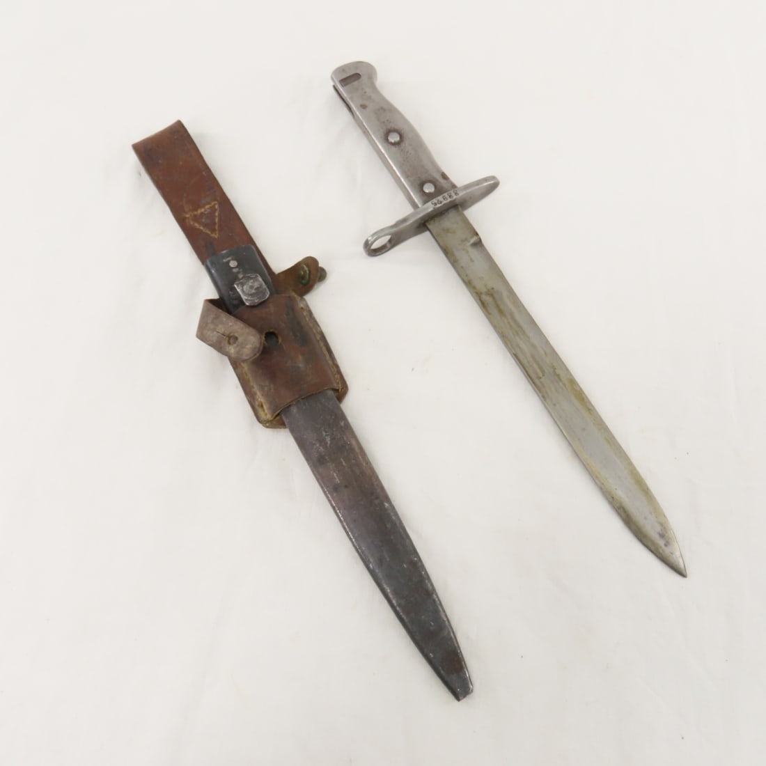 Turkish Mauser Bayonet with all Steel Grips: Turkish Mauser Bayonet with all Steel Grips - only marking is serial number 33925 on guard, has scabbard (damaged tip)and frog, Yugoslavian frog doesn't fit quite right. 14.25 OAL", blade just shy of
