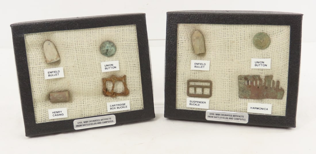 2 Sets Civil War Excavated Relics in Riker Cases: 2 Sets Civil War Excavated Relics in Riker Cases - purchased in San Antonio Texas, Enfield bullets, Union buttons, Henry casing, suspender buckle, cartridge box buckle and part of harmonica. LOT