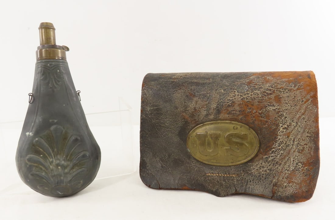 Civil War US Leather Cartridge Pouch & Flask: Civil War US Leather Cartridge Pouch & Flask - tin liners, edge stitching is separating, missing strap and has a couple of holes, worn condition. Metal flask is bent. LOT SIZE: 9x6x5" 4 LBS All inform