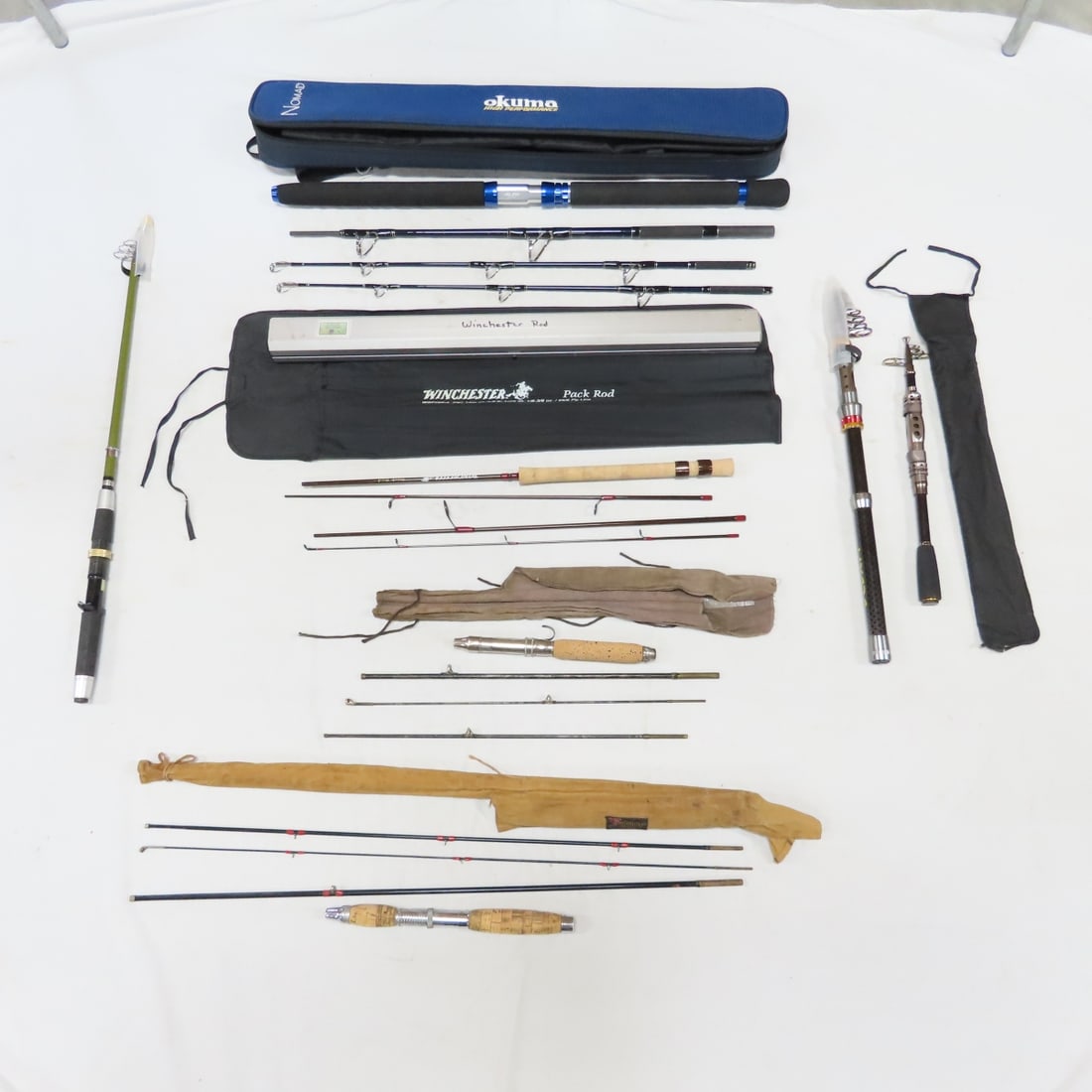 7 Vintage & Modern Travel Fishing Rods: 7 Vintage & Modern Travel Fishing Rods - Okuma Nomad 4-Piece NT-S-703M-MH 7' Rod in Padded Carry Case, Winchester 4-Piece Pack Rod WSF765-4 7'6" in Nylon & Aluminum Cases, Lixada Knight 360 Telescopic