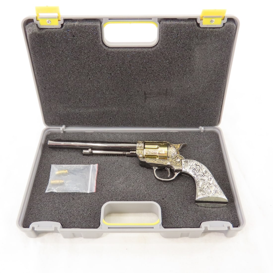 Metal 7 inch Replica .45 M1873 Colt Revolver: Metal 7 inch Replica .45 M1873 Colt Revolver - With case and 2 bullets. LOT SIZE: 8x5x2" 1 LB All information and photos, which are part of the description) are intended to be as accurate as possible,