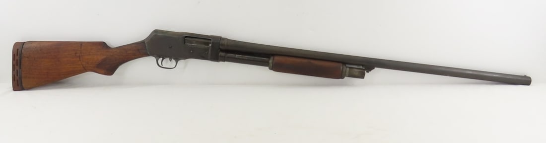Riverside Arms 12 GA Browning Patent Shotgun: Riverside Arms 12 GA Browning Patent Shotgun - house brand for J Stevens, SN# 54542 B, 30" proof tested barrel with front bead sight, pump action, checkered wood forearm and pistol grip stock (chips