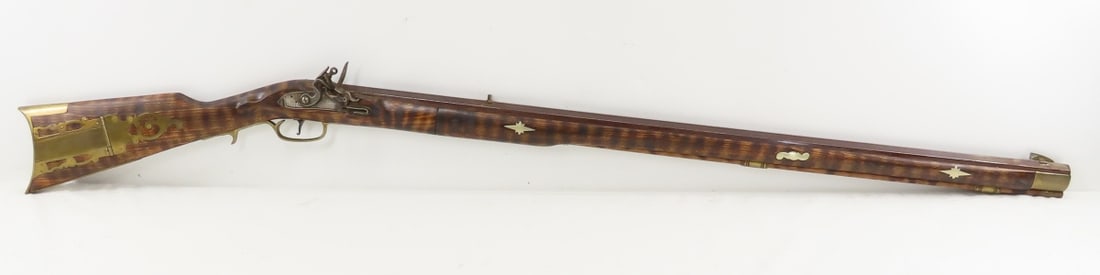 Jukar Spain Flintlock .45 Cal Muzzleloader: Jukar Spain Flintlock .45 Cal Muzzleloader - SN# 0055618, 34" octagon barrel with front blade brass sight, rear V sight, ram rod, brass accents, 2 piece stock that has "burned" stripes, 11.52 mm at mu