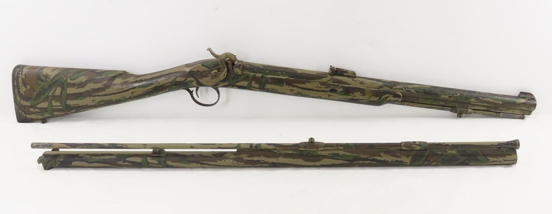 Thompson Center Arms .50Cal/12GA Tree Hawk Shotgun: Thompson Center Arms .50Cal/12GA Tree Hawk Shotgun - SN# illegible due to corrosion, percussion cap muzzle loader, 21" .50 cal barrel is on, includes 28" 12 GA barrel, both with rods, both are black p