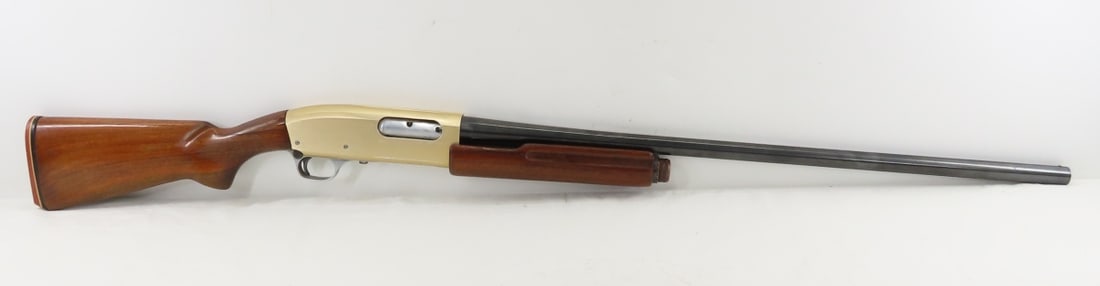 Hawthorne-Viking Montgomery Ward Co EJN 450 12 GA: Hawthorne-Viking Montgomery Ward Co EJN 450 12 GA - SN# 14518, 28" barrel with front bead sight, pump action, gold finish on receiver is wearing off, wood forearm and pistol grip stock with recoil