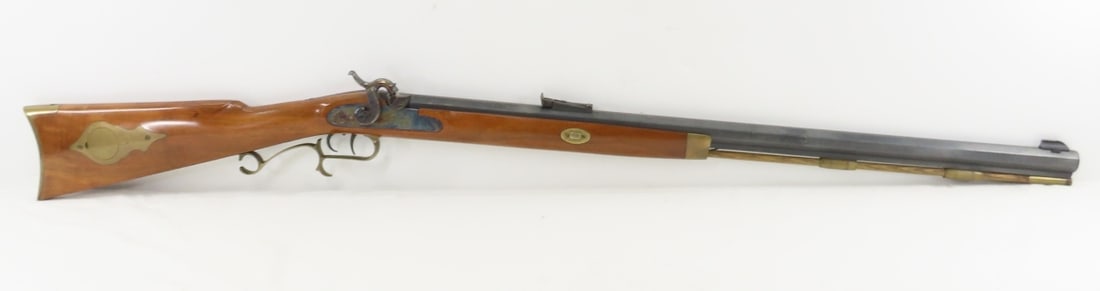 Thompson Center Arms .50 Cal Hawken Muzzleloader: Thompson Center Arms .50 Cal Hawken Muzzleloader - SN#164016, percussion cap, muzzle loader, 29" octagon barrel with front blade and rear adjustable sight, some tape residue on barrel, with rod, brass