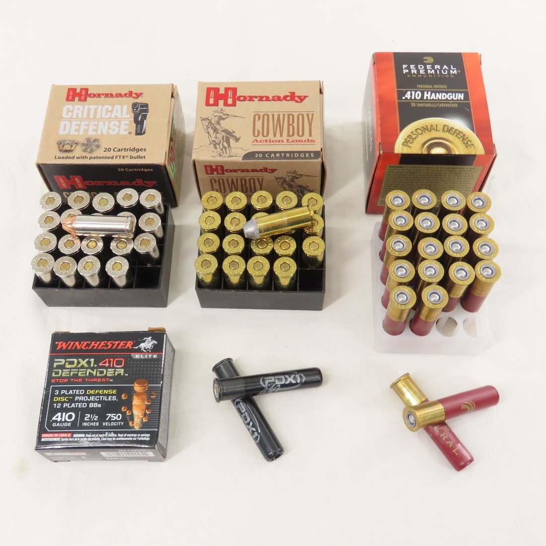 50 Rds Colt 45 & 27 Rds .410 Cartridges: 50 Rds Colt 45 & 27 Rds .410 Cartridges - 25 rounds Colt 45 in 1 box 185 gr FTX Critical Defense , and 25 rounds Colt 45 in 1 box 255 gr cowboy, 25 rounds +1 loose of Federal .410 Handgun, and 6 round
