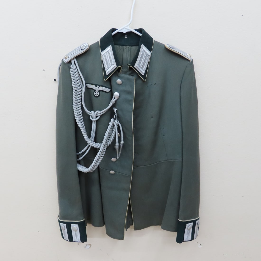 WWII German Heer Parade Tunic: WWII German Heer Parade Tunic - Collar tabs and cuff tabs sewed on post WWII, white stitches glow. White stitching in other part of the tunic do not glow under black light, there's an opening inside