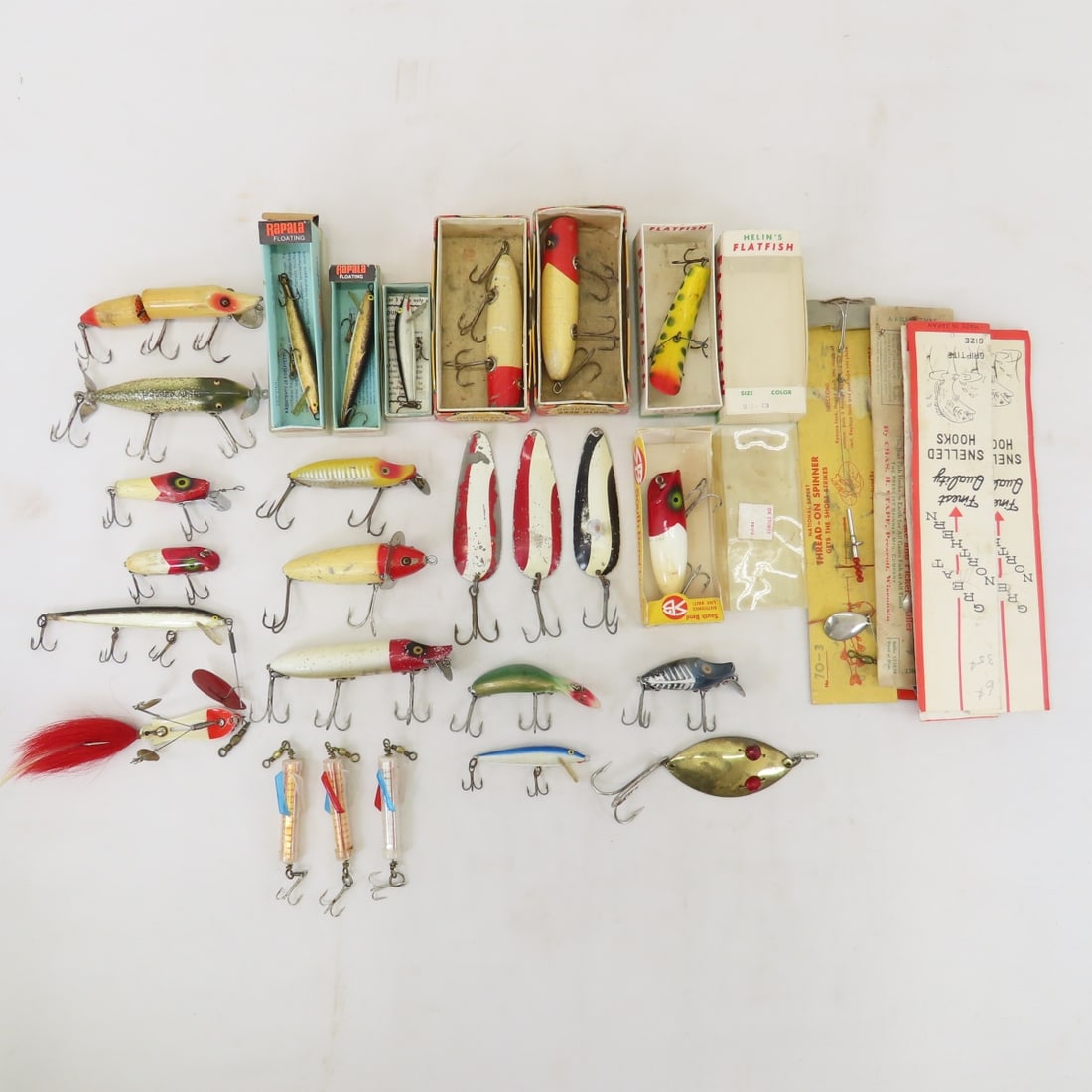 Vintage Fishing Lures & Spinners: Vintage Fishing Lures & Spinners - Vintage Fishing Lures & Spinners - Heddon, South Bend, Rapala & Others- some in original boxes. LOT SIZE: 8x8x8" 2 LBS All information and photos, which are part of