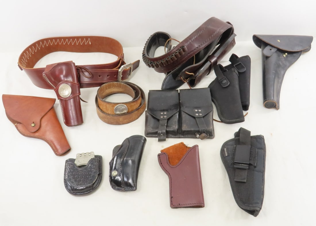 Handgun Holsters, Belts, Mag Pouch, Handcuffs: Handgun Holsters, Belts, Mag Pouch, Handcuffs - LOT SIZE: 12x12x12" 8 LBS All information and photos, which are part of the description) are intended to be as accurate as possible, but errors are