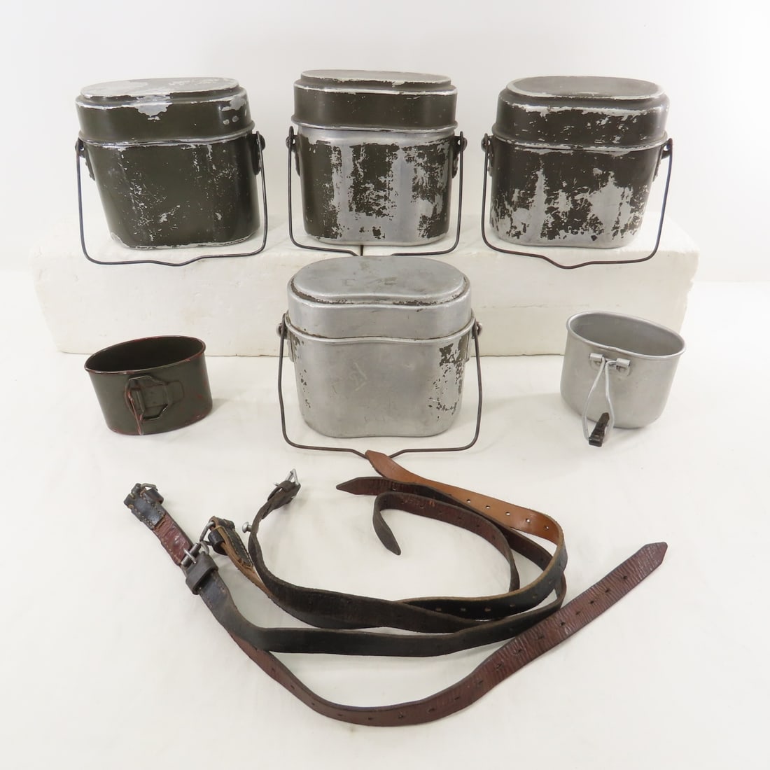 4 WWII German M31 Mess Kits, Straps & 2 Cups: 4 WWII German M31 Mess Kits, Straps & 2 Cups - MKL39, ESB 39,L&SL39, RI 38, 4 straps and 2 cups. LOT SIZE: 12x15x10" 5 LBS All information and photos, which are part of the description) are intended