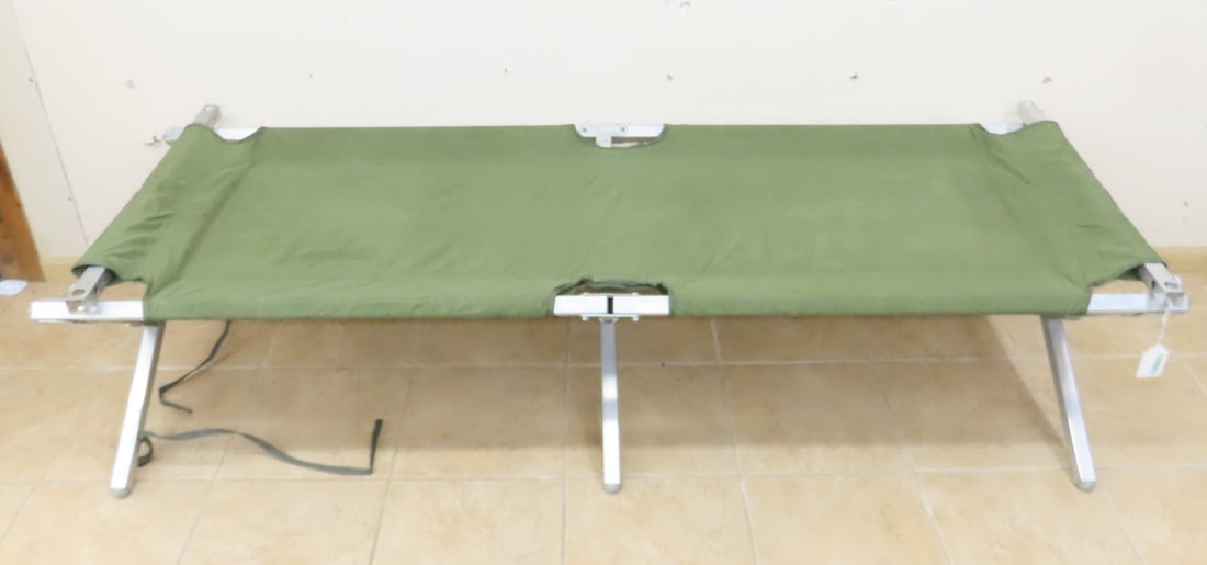 US Army Reyes FSCM 64307 Foldable Aluminum Cot: US Army Reyes FSCM 64307 Foldable Aluminum Cot - 75" Long x 26" Wide x 18" Tall, Folds Down to 37x8x4". LOT SIZE: 37x8x4" 16 LBS All information and photos, which are part of the description) are