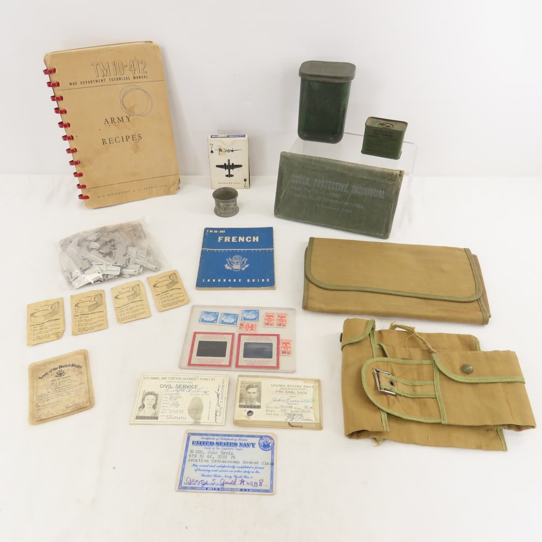 Military Can Openers, WWII Protective Cover & More: Military Can Openers, WWII Protective Cover & More - Spotter Cards, WWII ID cards and more. LOT SIZE: 8x6x4" 3 LBS All information and photos, which are part of the description) are intended to be as 