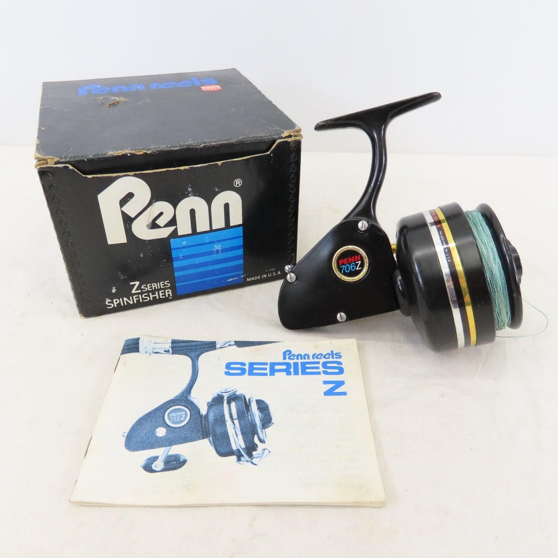Vintage Penn 706z Spinfisher Reel in Box: Vintage Penn 706z Spinfisher Reel in Box - Untested: Original Box, Instructions, Sales Receipts. LOT SIZE: 6x6x5" 2 LBS All information and photos, which are part of the description) are intended to