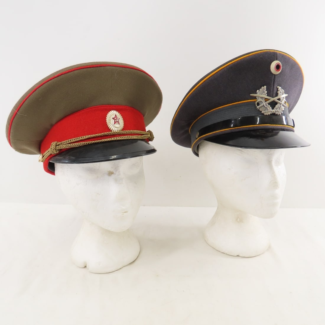W. German Recon Visor Cap & Soviet Officer Cap: W. German Recon Visor Cap & Soviet Officer Cap - W. German Panzeraufklarer (armoured recon) by Bamberger size 56, Soviet Officer cap size 56. LOT SIZE: 12x12x10" 2 LBS All information and photos,