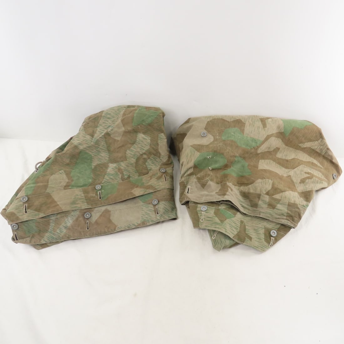 2 WWII German Splinter Camo Tent Shelter Quarters: 2 WWII German Splinter Camo Tent Shelter Quarters - LOT SIZE: 15x12x8" 7 LBS All information and photos, which are part of the description) are intended to be as accurate as possible, but errors are p