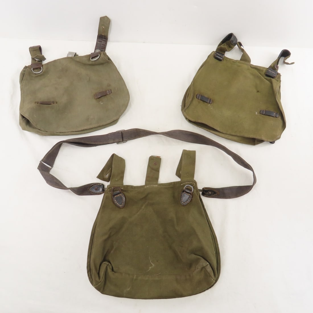 3 WWII German Olive Drab Bread Bags: 3 WWII German Olive Drab Bread Bags - 1 stamped V10802 (hard to read). LOT SIZE: 12x11x5" 2 LBS All information and photos, which are part of the description) are intended to be as accurate as