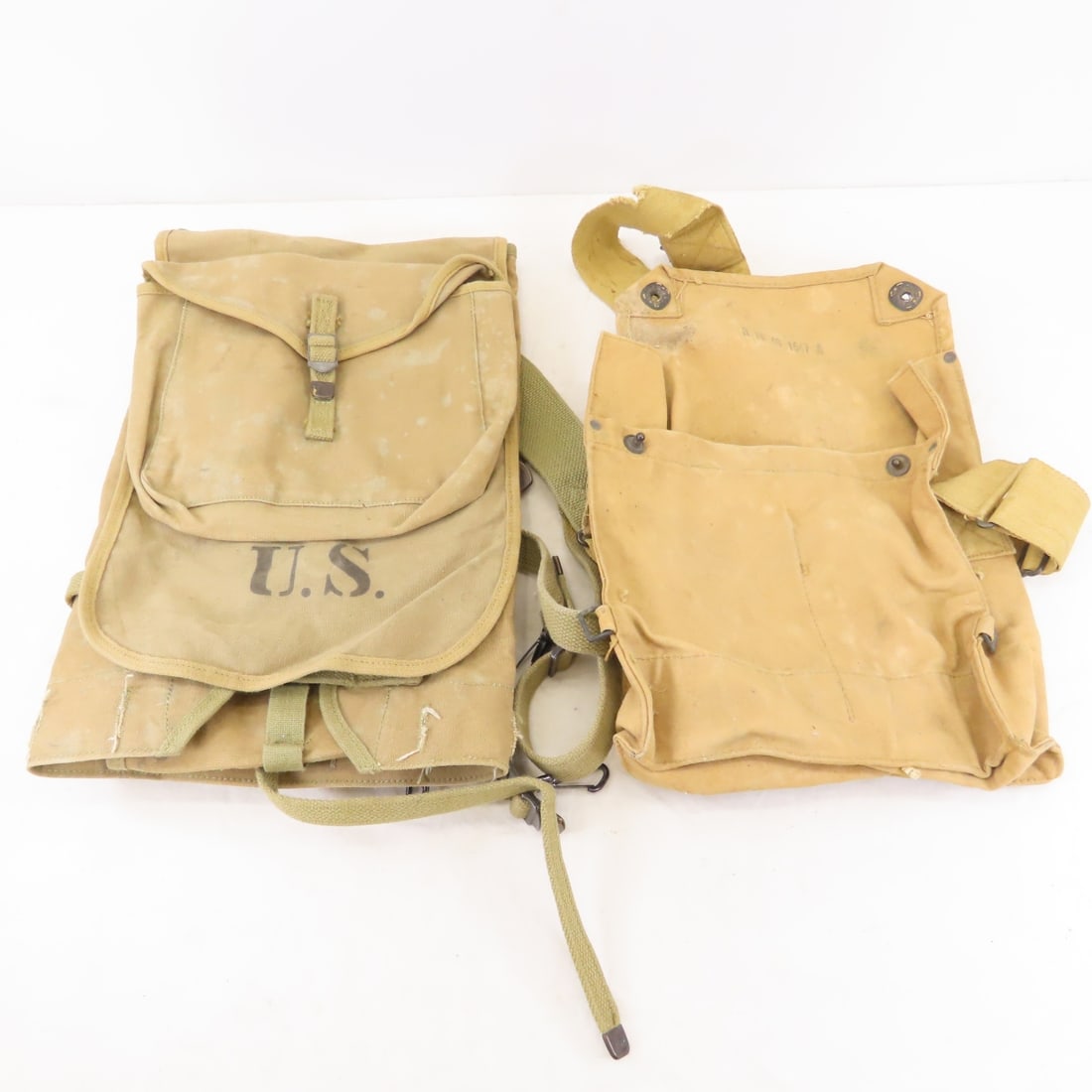 US WWII M1928 Haversack Field Pack & Bag: US WWII M1928 Haversack Field Pack & Bag - canvas bag marked R 18 50 1547 A, pack marked US. LOT SIZE: 16x11x3" 4 LBS All information and photos, which are part of the description) are intended to be