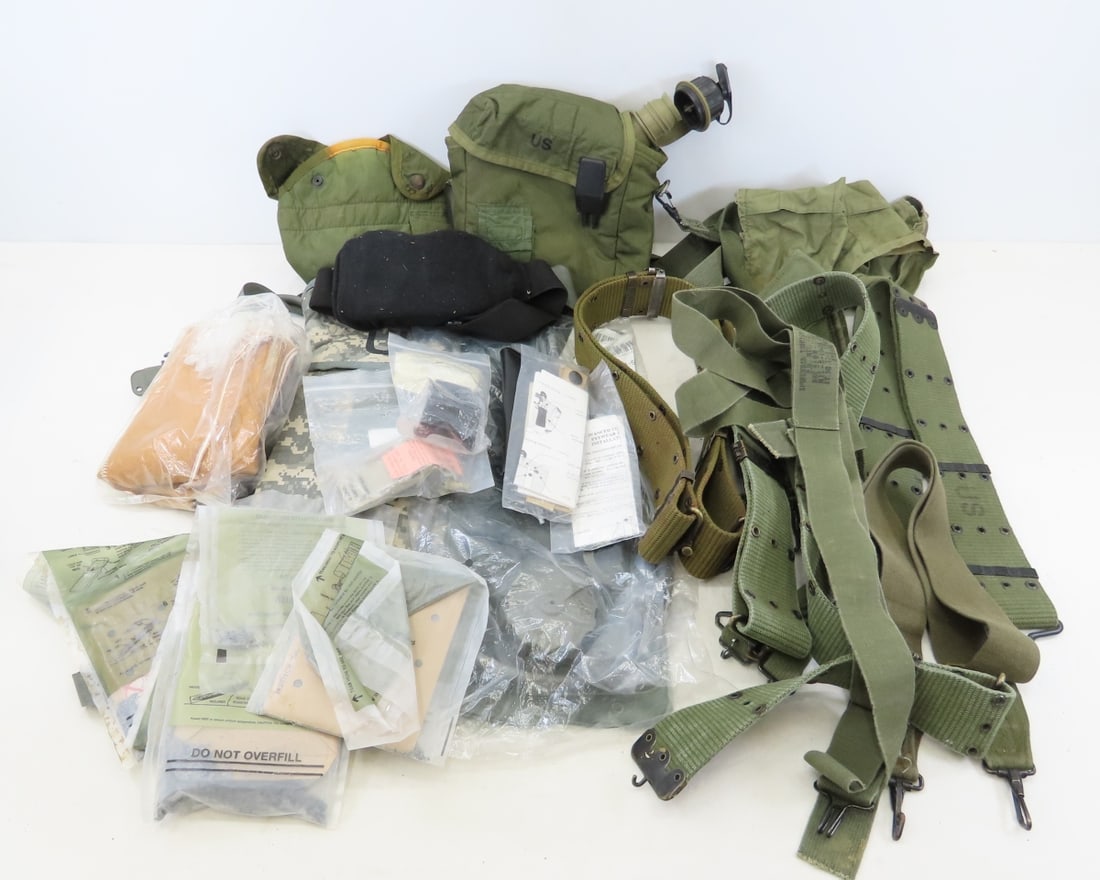 US Army Camelback Bag, Belts, Pouches & More: US Army Camelback Bag, Belts, Pouches & More - Cold Weather Canteen Covers, Goggles, Camelback Bag with Bladder, M1915 Suspenders & More. LOT SIZE: 12x12x12" 9 LBS All information and photos, which