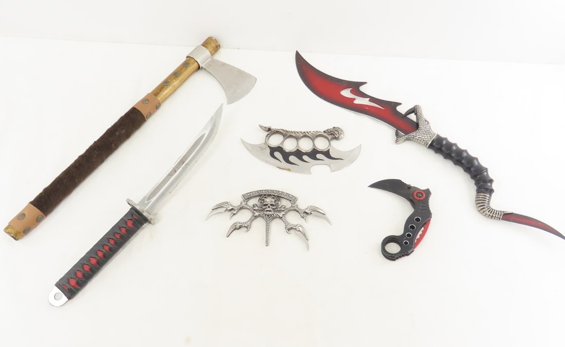 Fantasy Knives, Hatchet, Short Sword, & More: Fantasy Knives, Hatchet, Short Sword, & More - most marked made in China. LOT SIZE: 22x8x4" 3 LBS All information and photos, which are part of the description) are intended to be as accurate as