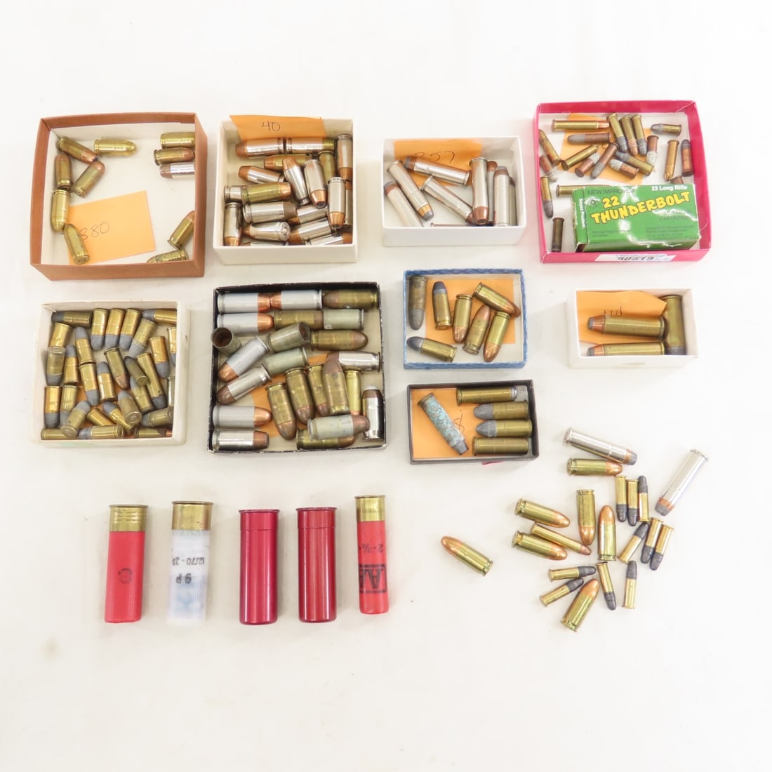 Assorted Handgun Ammunition and Shotgun Cartridges: Assorted Handgun Ammunition and Shotgun Cartridges - .22, 9mm, .32, .357, .38, .40, .380, .44, 45, and 5 assorted shot shells. LOT SIZE: 6x6x6" 4.5 LBS All information and photos, which are part of
