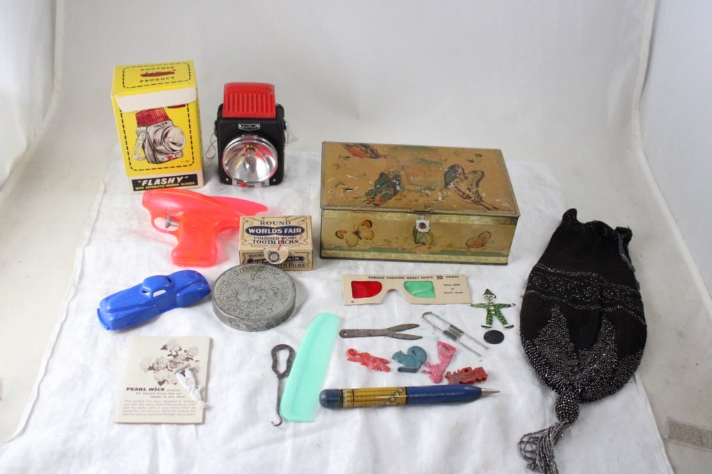 Art Candy Tin, Flapper Bag, 3-D Magic Glasses: Art Candy Tin, Flapper Bag, 3-D Magic Glasses - World's Fair Polished Wood Toothpicks, Renwal Sedan, Squirt Gun and other smalls. Lot Size 9" x 7" x 6". 2 Lbs. All information and photos, which are pa