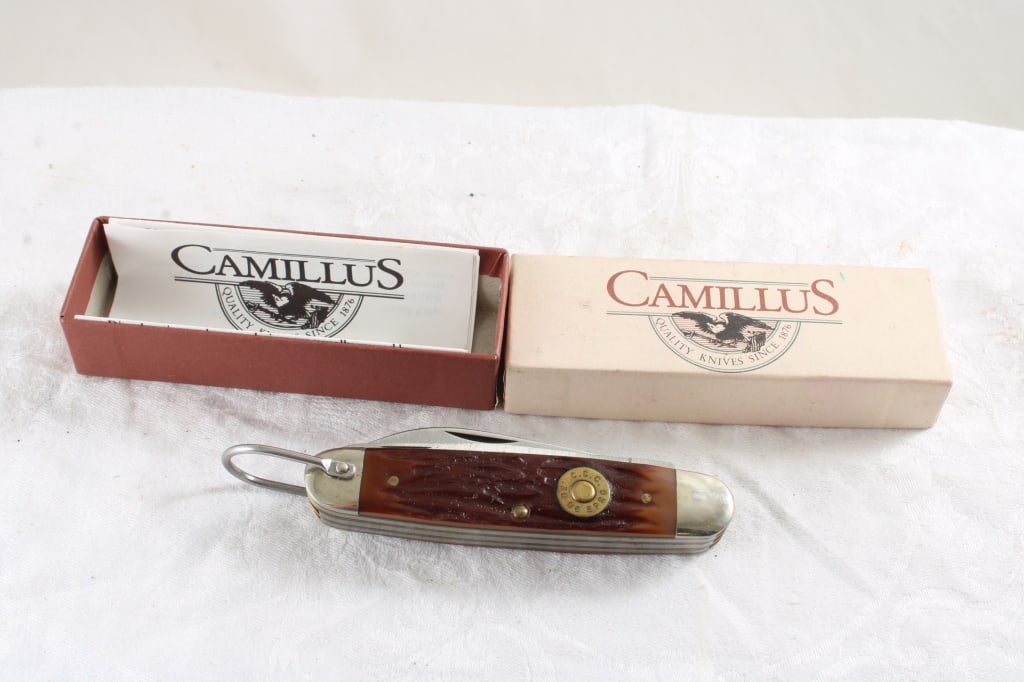 Camillus Folding Knife Model C-4 New in Box: Camillus Folding Knife Model C-4 New in Box - Lot Size 4" x 2" x 2". .5 Lb. All information and photos, which are part of the description, are intended to be as accurate as possible, but errors are