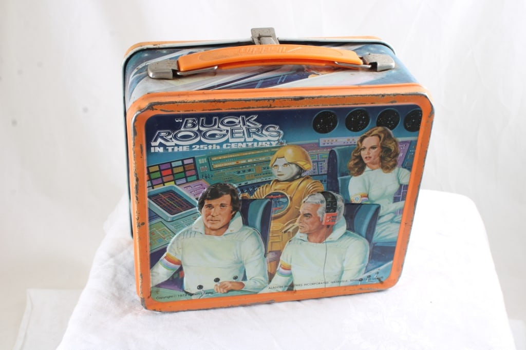 1979 Buck Rogers Metal Lunchbox NO THERMOS: 1979 Buck Rogers Metal Lunchbox NO THERMOS - Aladdin. Lot Size 8" x 8" x 4". 1 Lb. All information and photos, which are part of the description, are intended to be as accurate as possible, but