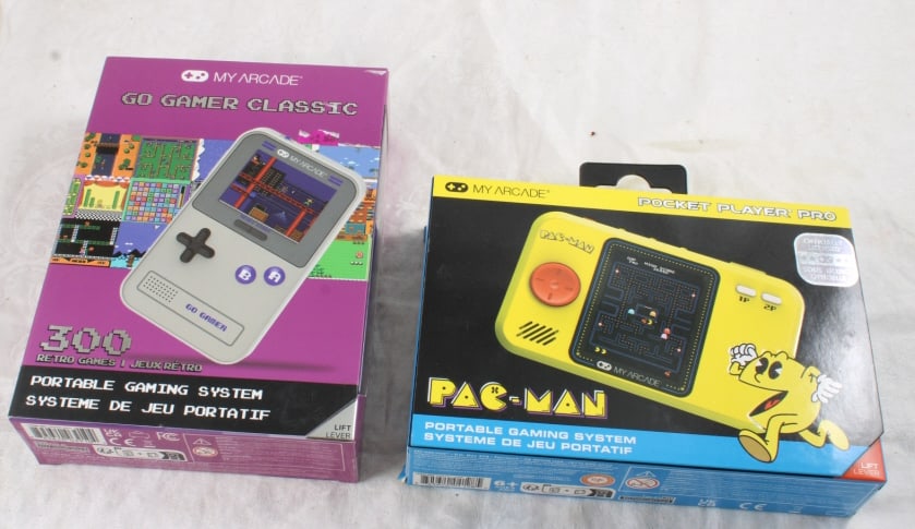 Pac-Man Pocket Player, Arcade Portable System: Pac-Man Pocket Player, Arcade Portable System - Both new in boxes. Lot Size 7" x 5" x 4". 2 Lb. All information and photos, which are part of the description, are intended to be as accurate as possibl