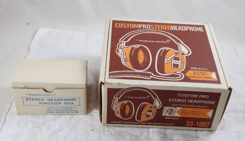 Realistic Headphone & Junction Box Headphone: Realistic Headphone & Junction Box Headphone - Both in boxes. Lot Size 9" x 9" x 9". 3 Lbs. All information and photos, which are part of the description, are intended to be as accurate as possible, b