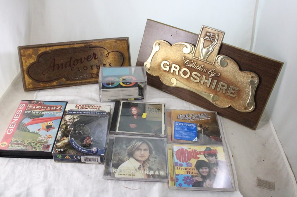 Antique Easel Store Display Signs, DVD's & More: Antique Easel Store Display Signs, DVD's & More - Star Trek Star Discs of the 60 there are 4 Missing #24, 42, 59 & 60. Sega Genesis Pacman2 The New Adventures Game, Dungeons & Dragons Primal Heroes