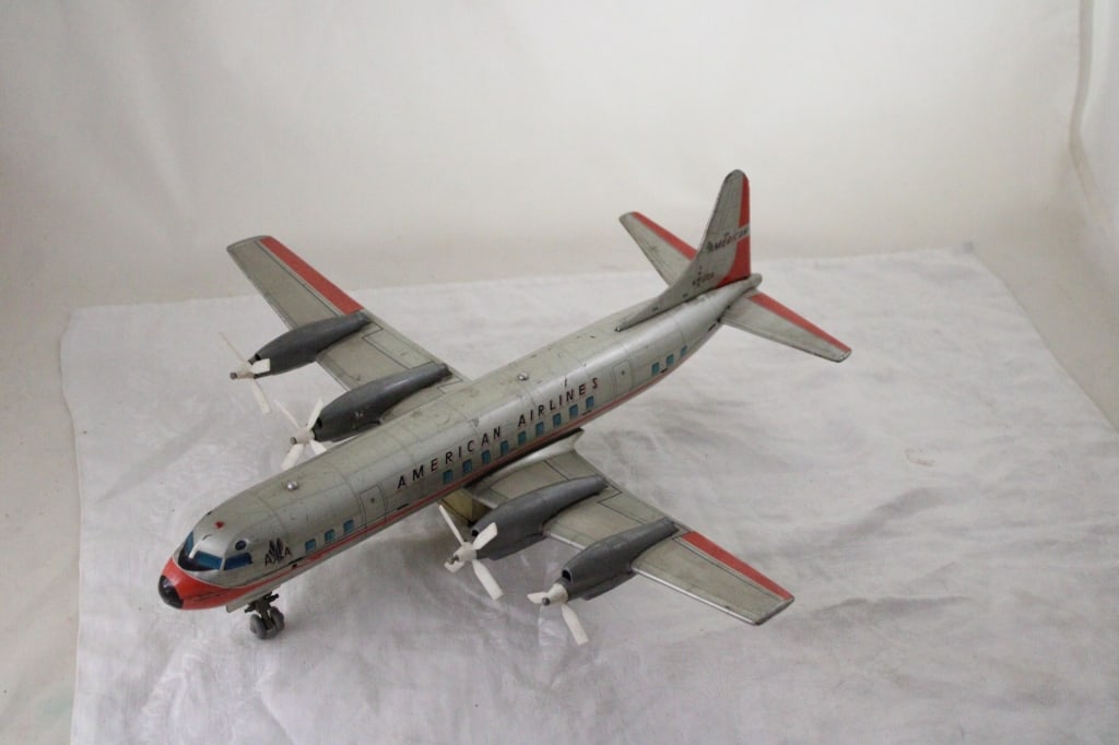 Marx American Airlines Battery Operated Plane: Marx American Airlines Battery Operated Plane - Works #N6100A. Wing Span 14". Total Length 15". Lot Size 15" x 6" x 6". 1 Lb. All information and photos, which are part of the description, are