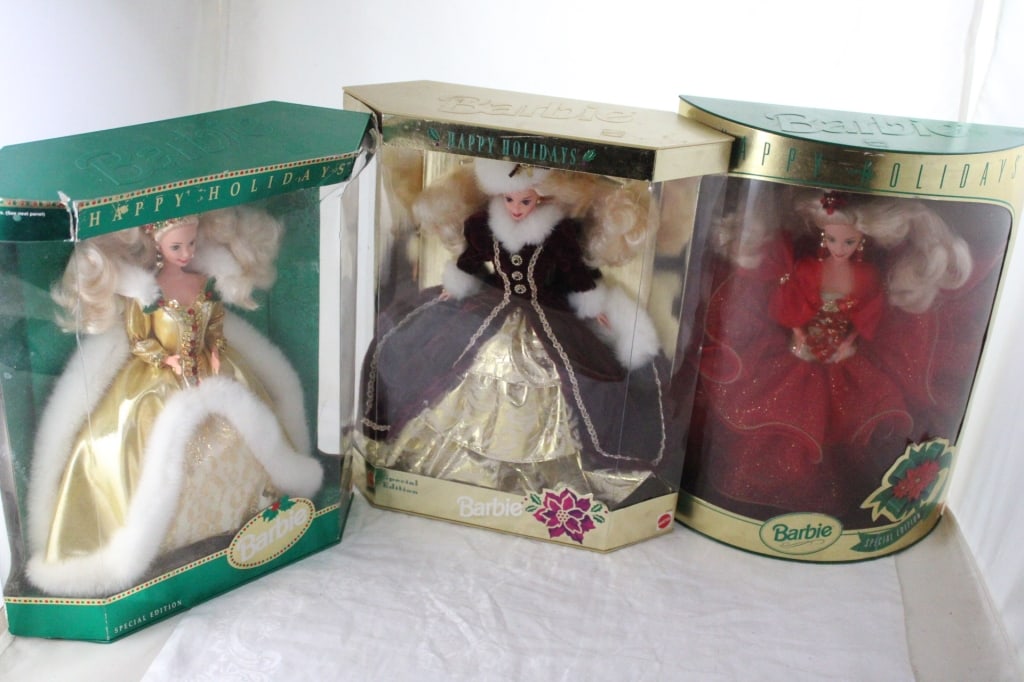 3 Holiday Barbies Special Editions 1993, 94, 96: 3 Holiday Barbies Special Editions 1993, 94, 96 - Lot Size 14" x 13" x 13". 4 Lbs. All information and photos, which are part of the description, are intended to be as accurate as possible, but errors
