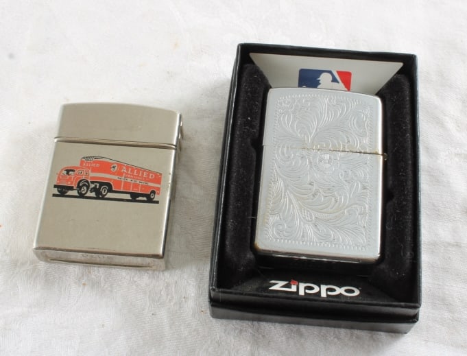 1984 Embossed Zippo & Allied Van Lines Lighters: 1984 Embossed Zippo & Allied Van Lines Lighters - DLITE Lighter. 1984 Zippo in Box. Lot Size 4" x 3" x 2". .5 Lbs. All information and photos, which are part of the description, are intended to be as