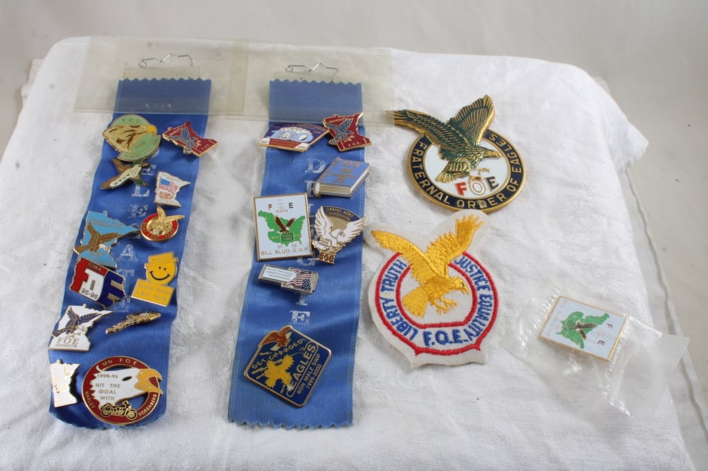 22 Fraternal Order of Eagles Pins, Patch, Emblem: 22 Fraternal Order of Eagles Pins, Patch, Emblem - Lot Size 6" x 5" x 2". .5 Lb. All information and photos, which are part of the description, are intended to be as accurate as possible, but errors