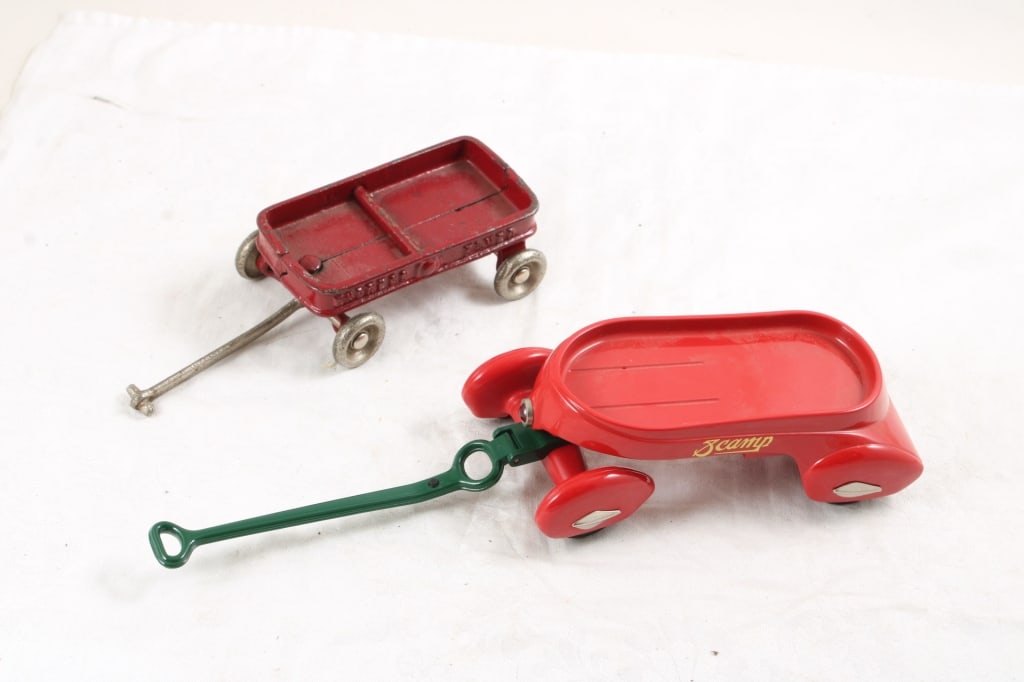 Cast Iron Express Flyer & Hallmark Scamp Wagons: Cast Iron Express Flyer & Hallmark Scamp Wagons - Hallmark Wagon is 7" not including handles. Lot Size 7" X 6" x 4". 2 Lbs. All information and photos, which are part of the description, are intended