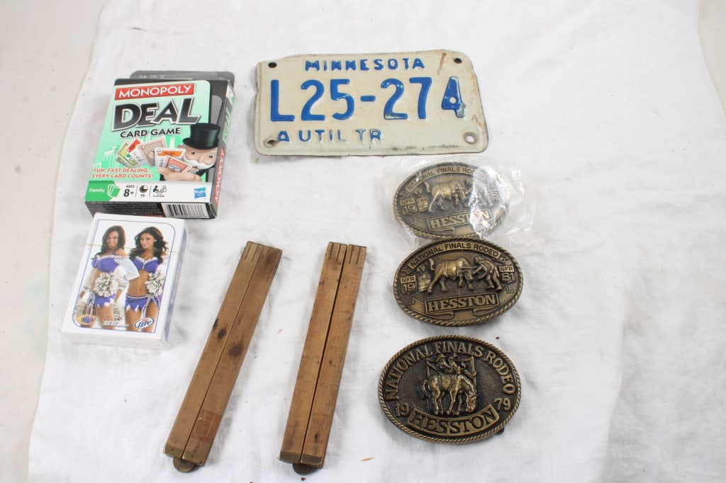 MN Utility Plate, Hesston Rodeo Buckles & More: MN Utility Plate, Hesston Rodeo Buckles & More - Monopoly Card Game, Minnesota Vikings. Unopened Miller Light Playing Cards, 2 Wood Rules. Lot Size 7" x 5" x 3". 2 Lbs. All information and photos,