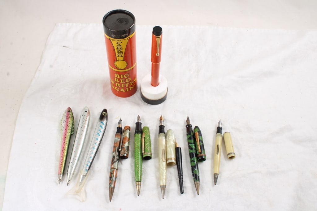 Parker Big Red & Fish Pens and Mechanical Pencils: Parker Big Red & Fish Pens and Mechanical Pencils - Signatory Fountain Pen, Mechanical pencils. Parker Big Red in original box and appears new. Lot Size 7" x 5" x 3". .5 Lb. All information and