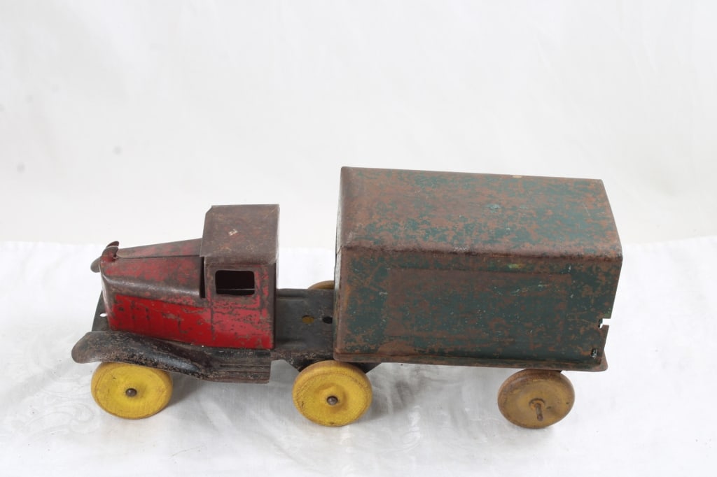 1930's Girard Pressed Steel Delivery Truck 12": 1930's Girard Pressed Steel Delivery Truck 12" - Lot Size 6" x 6" x 6". 2 Lbs. All information and photos, which are part of the description, are intended to be as accurate as possible, but errors are