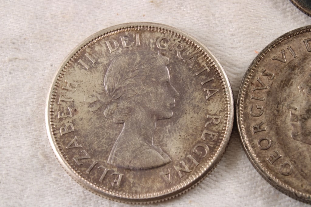 4 Foreign 80% Silver Coins - 4