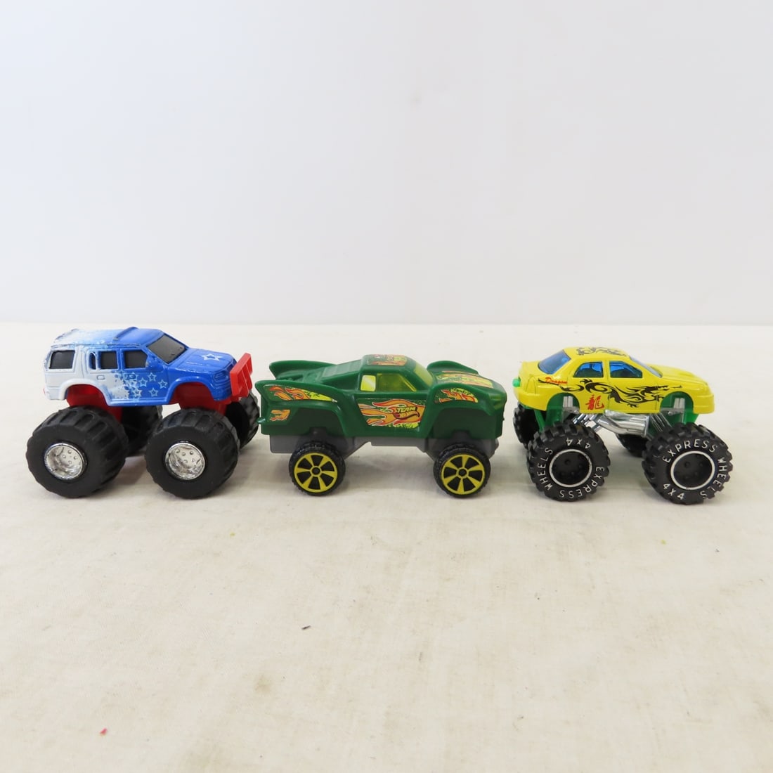 Monster Truck collections, most 1/16 scale, 3 NIP - 14