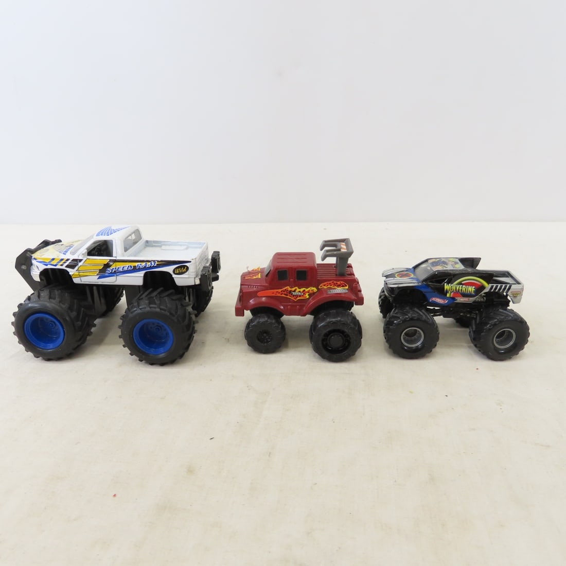 Monster Truck collections, most 1/16 scale, 3 NIP - 15