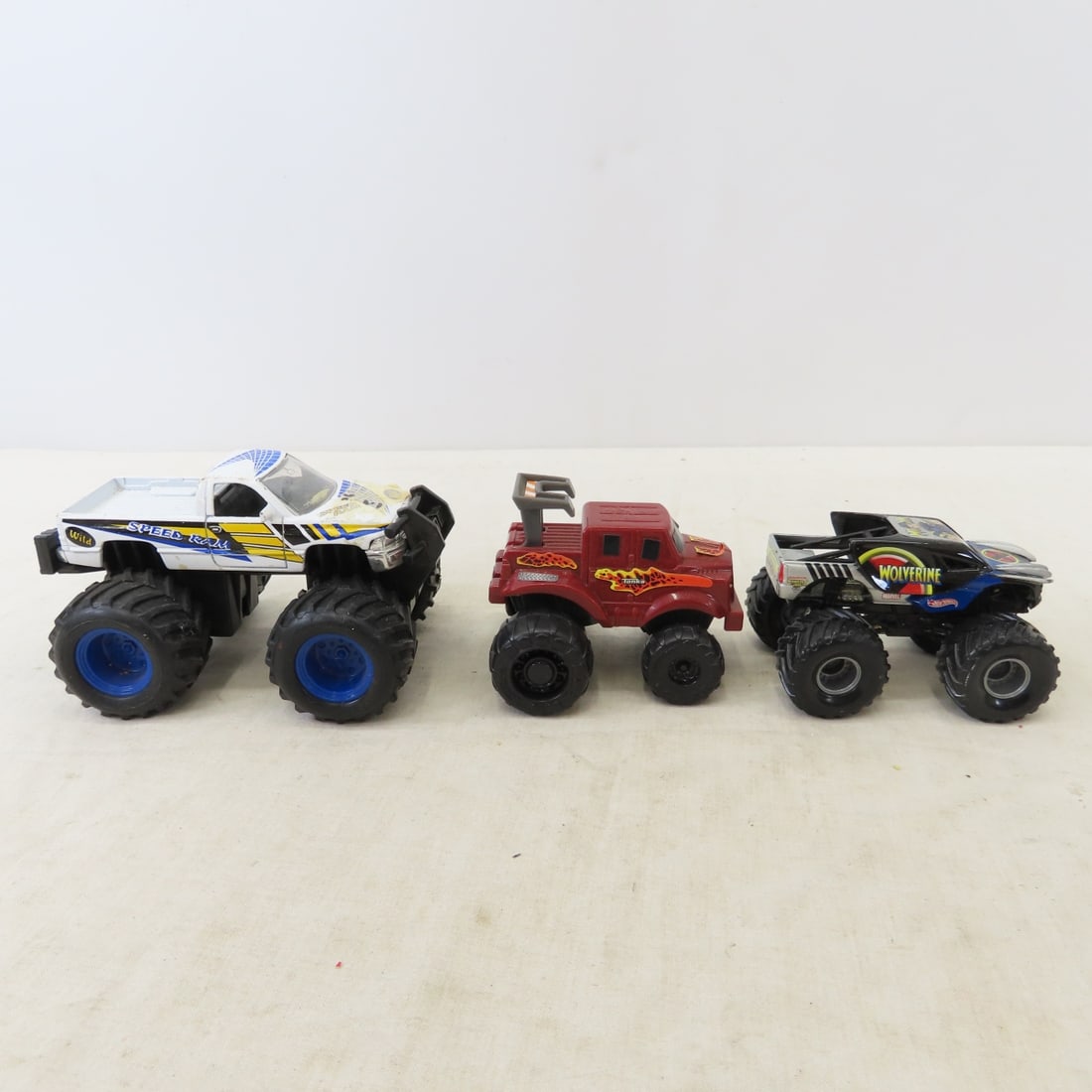 Monster Truck collections, most 1/16 scale, 3 NIP - 16