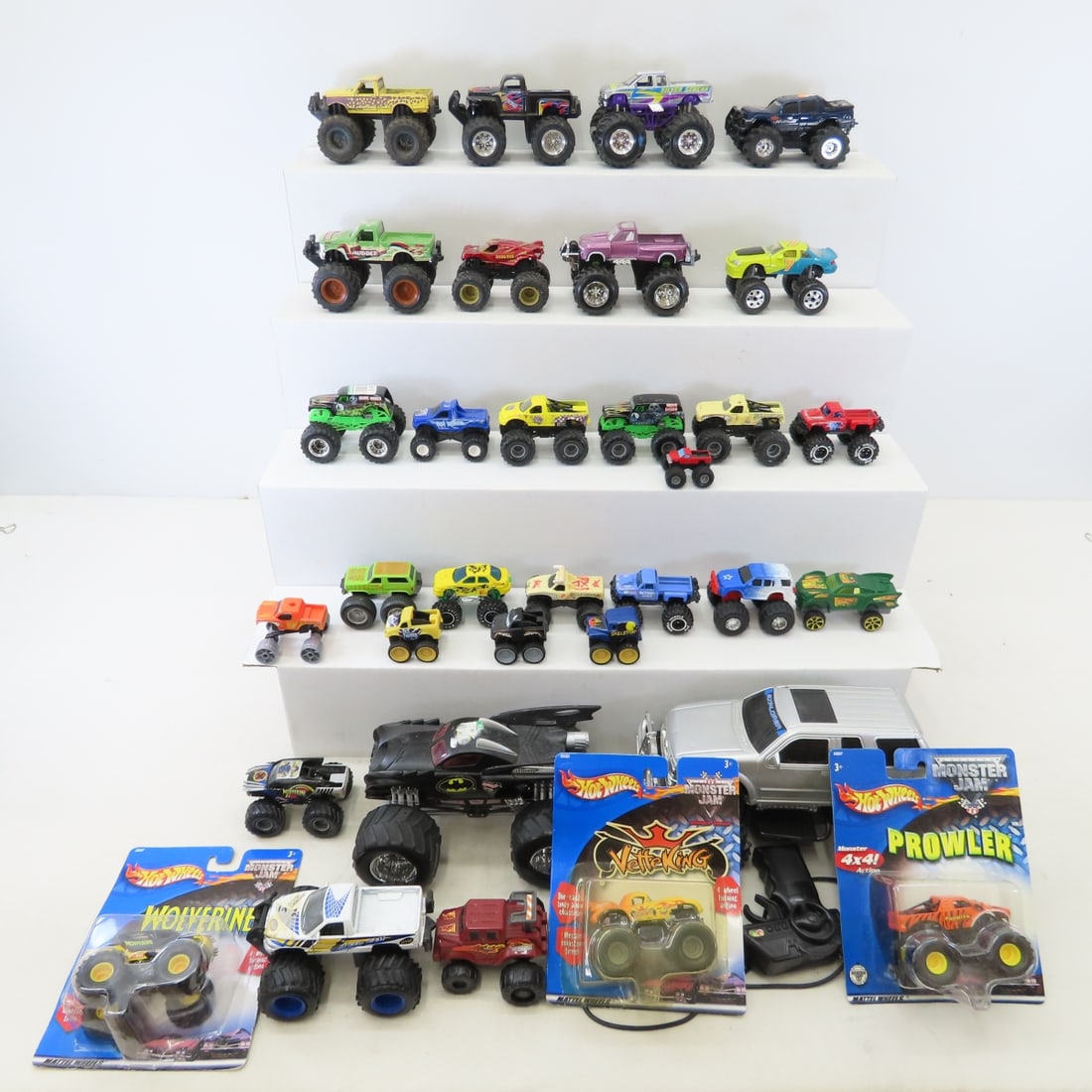 Monster Truck collections, most 1/16 scale, 3 NIP: Monster Truck collections, most 1/16 scale, 3 NIP - 3 Hot Wheels Monster Trucks on cards, some larger scale. LOT SIZE: 18x18x18" 10 LBS All information and photos, which are part of the description)