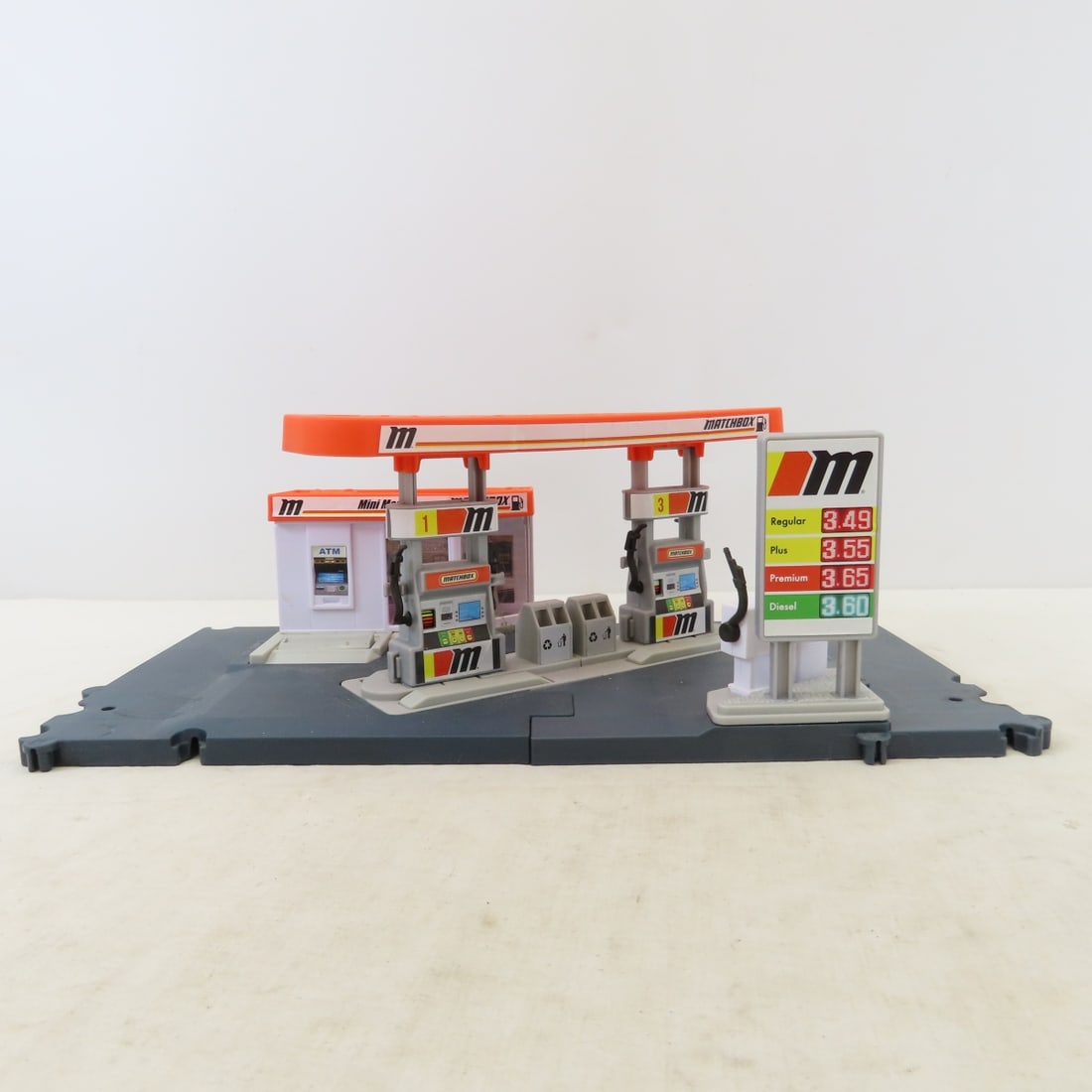 70+ Diecast cars in 2 Cases, Matchbox Gas Station - 12