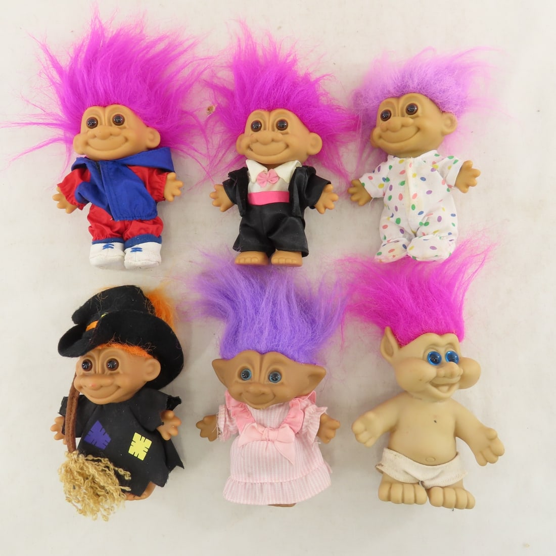Collection of Treasure Trolls in Case & More - 5
