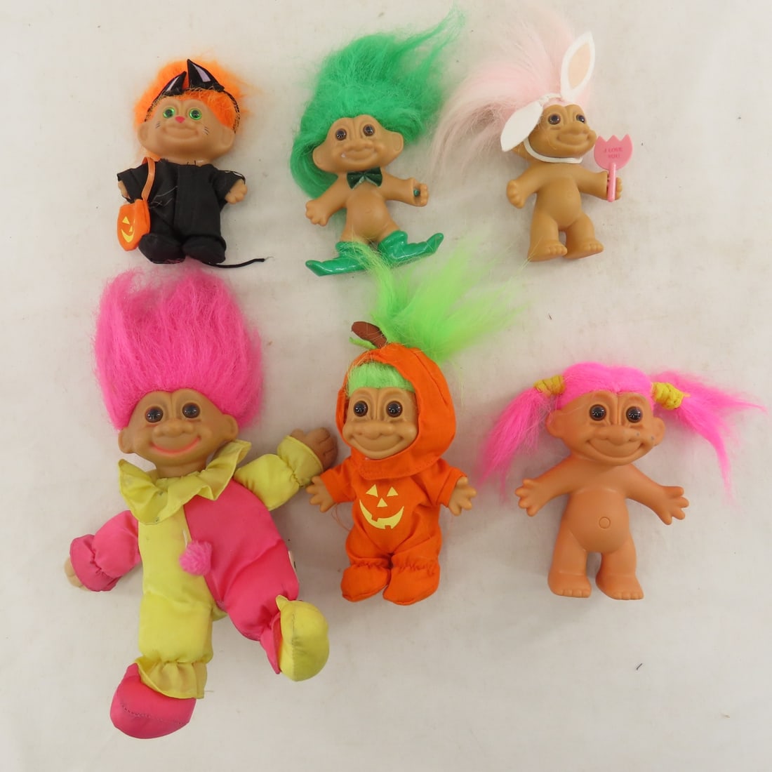 Collection of Treasure Trolls in Case & More - 7