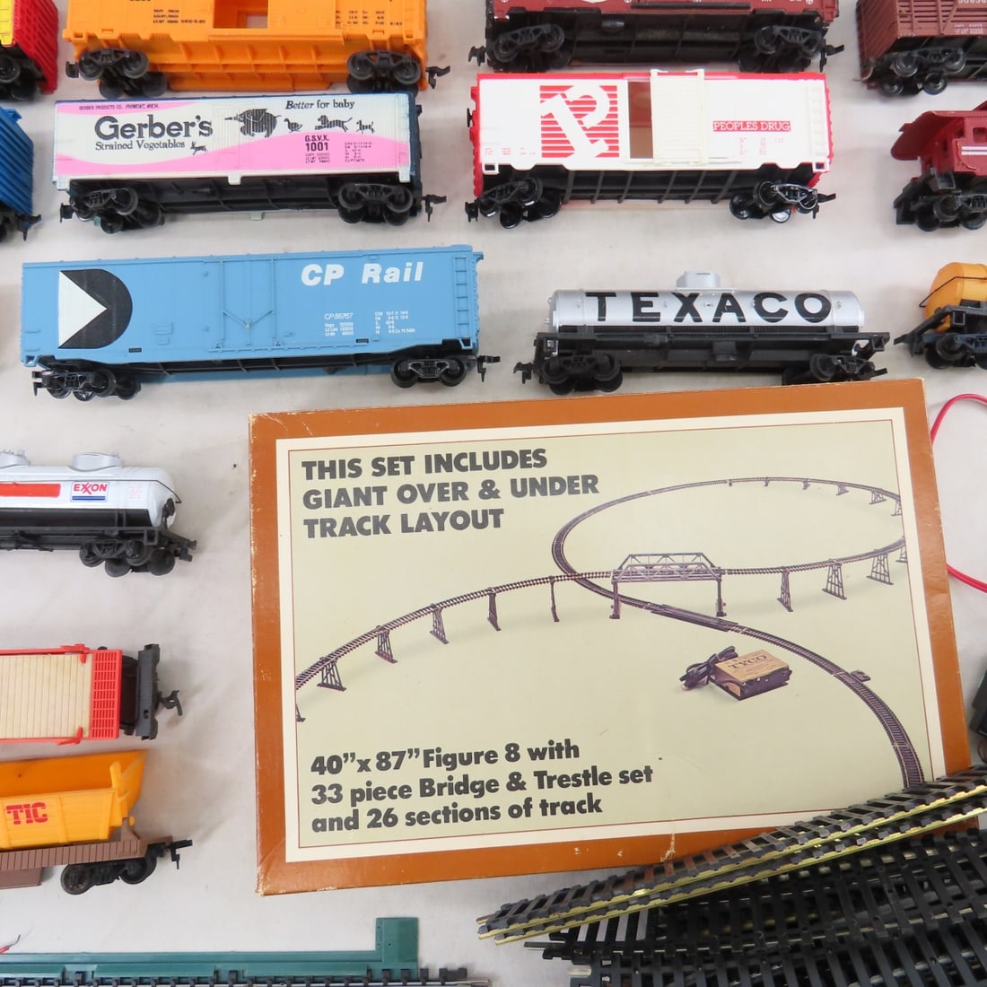 Assorted HO Scale Engines, Train Cars & Track - 9