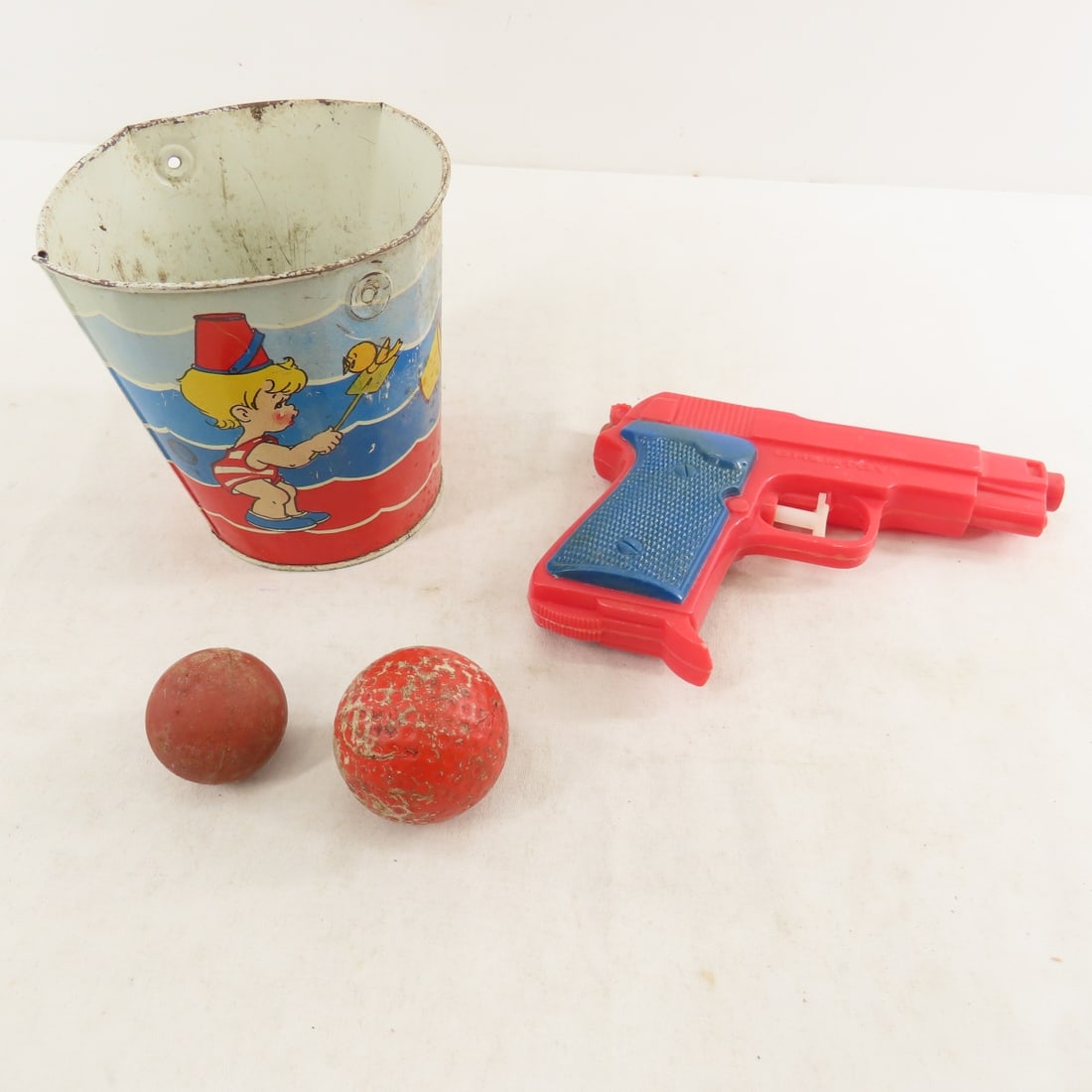 Vintage Cap Guns, Tops, Wind-Up Car & More - 8