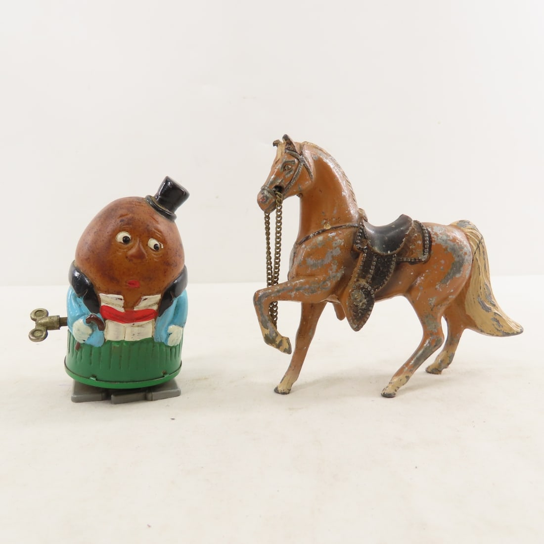 Vintage Cap Guns, Tops, Wind-Up Car & More - 9